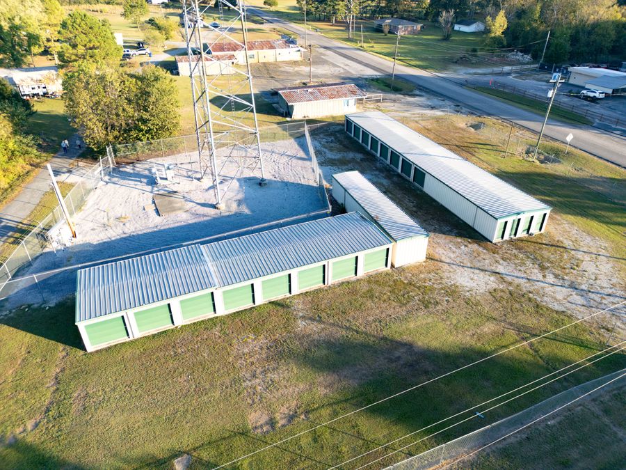 Aerial view of the three Store Base storage buildings beside Old US Hwy 278